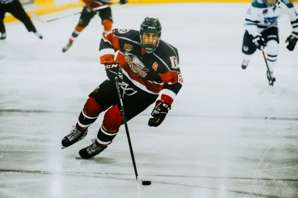 hockey player skating on ice